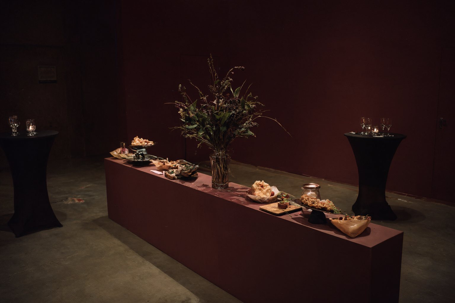 A museum gallery set for an evening reception